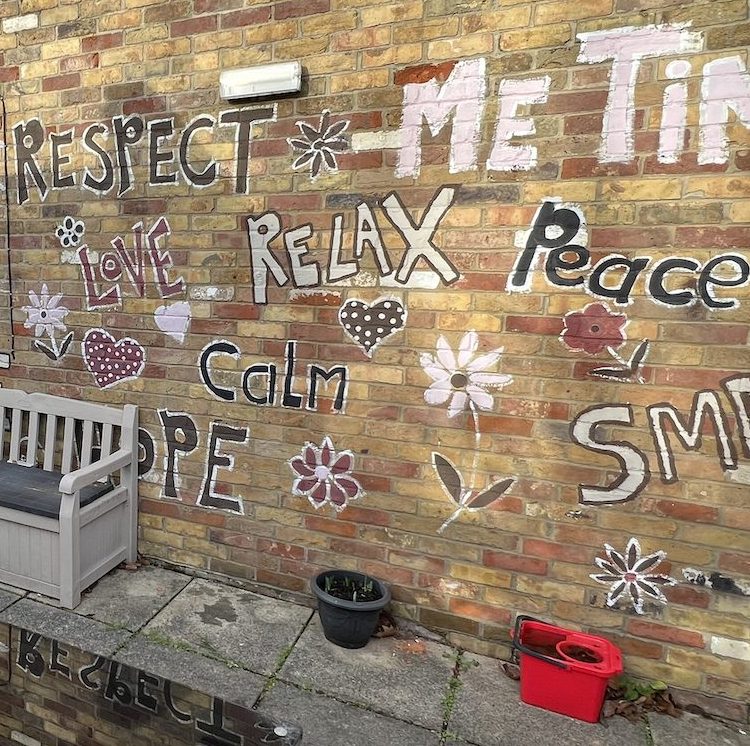 The mural in the courtyard garden at our Ware Crisis Cafe