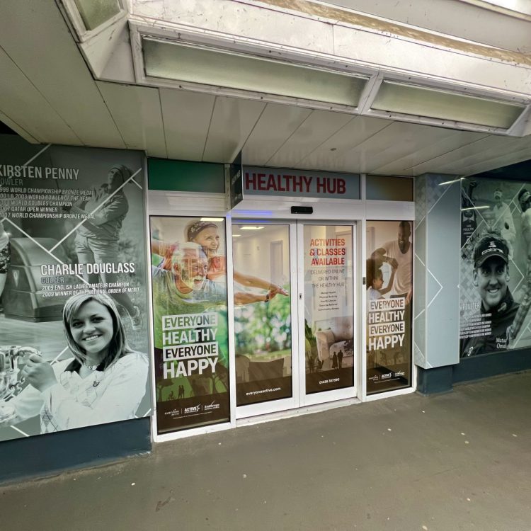 the photo shows the entrance of the Stevenage crisis cafe, which has two glass sliding doors